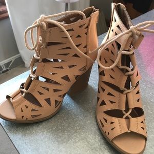 Super cute nude sandal with stacked heel!